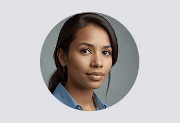 Head and shoulders photo of female freelancer wearing a light blue shirt