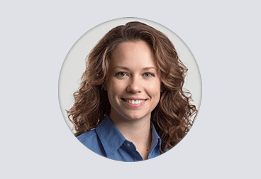 Head and shoulders photo of female freelancer wearing blue shirt